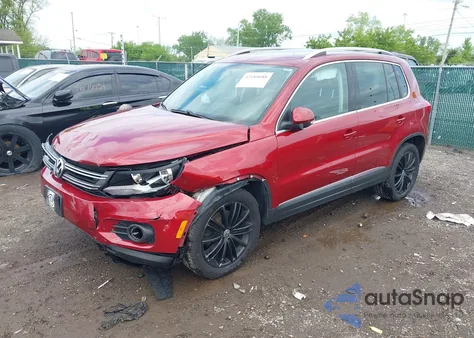 2014 Volkswagen Tiguan Sel из США, поврежденный, VIN WVGBV3AX1EW033760